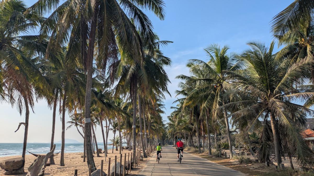 My son James and our excellent guide cycling on our Thailand's Coasts - Bangkok to Khao Lak Bike Tour