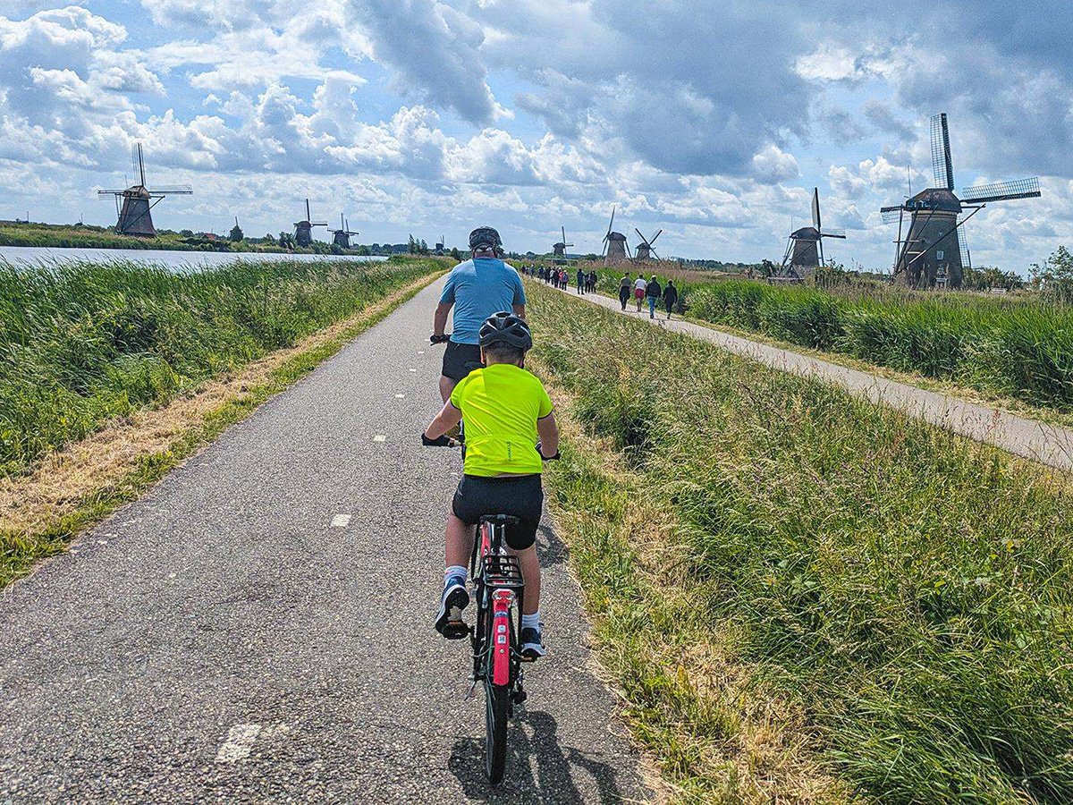 Project Manager Saul and our son James cycling through Kinderdijk's windmills in May 2025 Project Manager Saul and our son James cycling through Kinderdijk's windmills in May 2025