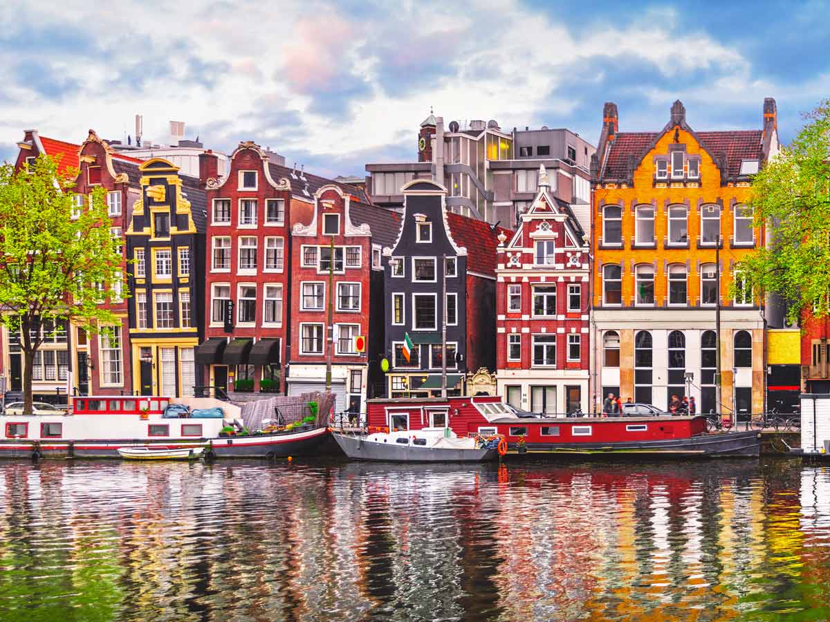 Colourful buildings along a canal in Amsterdam